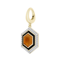 Gold pendant with a hexagonal design featuring a brown gemstone and black border on a white background.